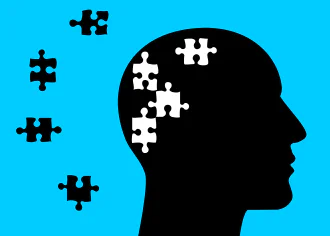 Illustration of a silhouette of a bald head with puzzle pieces\nmissing from the cranium, all on a blue background.\n